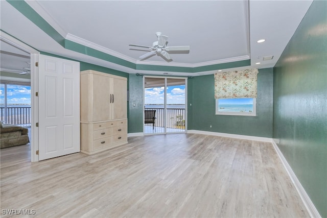 15220 Portside Dr Unit 301, Fort Myers, FL 33908 - unfurnished bedroom featuring baseboards, access to outside, and multiple windows