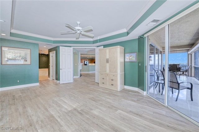 15220 Portside Dr Unit 301, Fort Myers, FL 33908 - spare room with baseboards, a ceiling fan, a tray ceiling, and visible vents