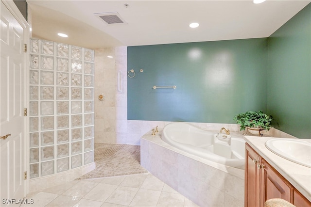15220 Portside Dr Unit 301, Fort Myers, FL 33908 - bathroom with recessed lighting, tile patterned flooring, visible vents, a bath, and walk in shower