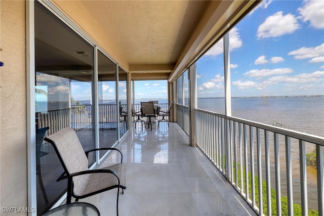 15220 Portside Dr Unit 301, Fort Myers, FL 33908 - balcony featuring a water view and visible vents