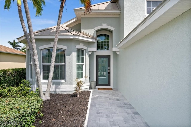 2513 Blackburn Cir, Cape Coral, FL 33991 - view of exterior entry featuring stucco siding