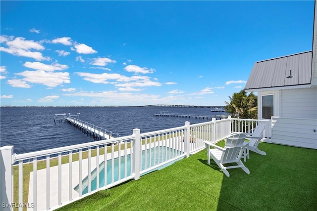 8451 Casa Del Rio Ln, Fort Myers, FL 33919 - view of yard featuring a water view, a dock, and an outdoor pool