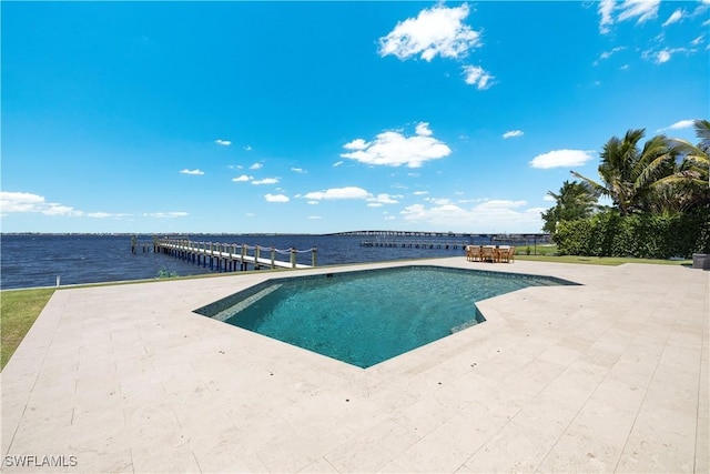 8451 Casa Del Rio Ln, Fort Myers, FL 33919 - view of swimming pool featuring a water view and a patio area