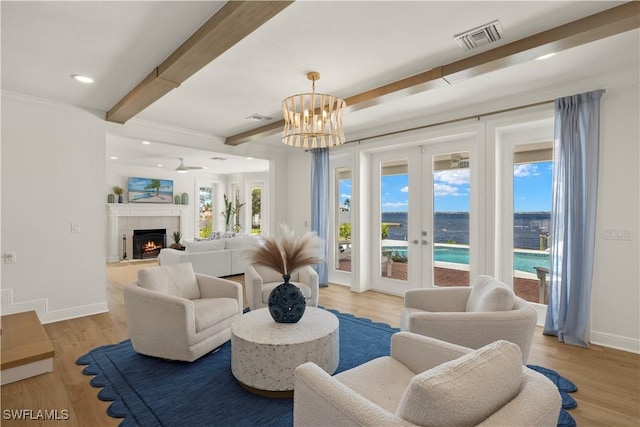 8451 Casa Del Rio Ln, Fort Myers, FL 33919 - living area with french doors, visible vents, baseboards, and beamed ceiling