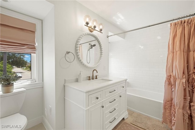8451 Casa Del Rio Ln, Fort Myers, FL 33919 - full bathroom featuring shower / tub combo, toilet, vanity, and tile patterned floors