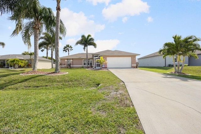 single story home featuring an attached garage, driveway, a front yard, and stucco siding