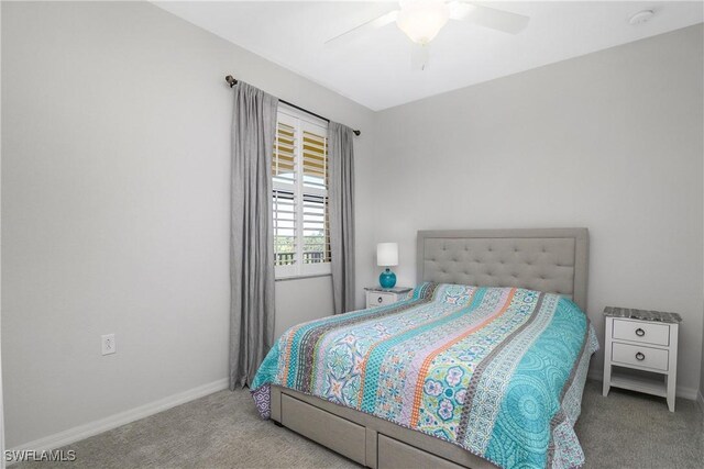 9719 Acqua Ct Unit 241, Naples, FL 34113 - carpeted bedroom with baseboards and ceiling fan