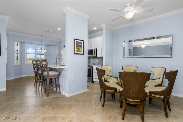 9719 Acqua Ct Unit 241, Naples, FL 34113 - dining room featuring a ceiling fan, baseboards, ornamental molding, a chandelier, and recessed lighting