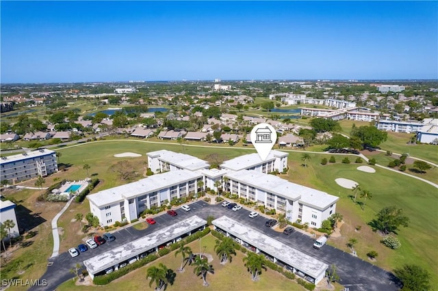 6102 Augusta Dr Unit 315, Fort Myers, FL 33907 - aerial view featuring view of golf course and a water view