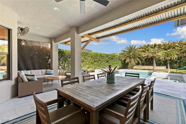 4045 Nova Ln, Naples, FL 34119 - view of patio / terrace with outdoor dining area, outdoor lounge area, an outdoor pool, and ceiling fan