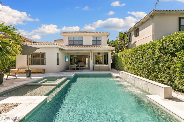 4045 Nova Ln, Naples, FL 34119 - rear view of house featuring an outdoor living space, a pool with connected hot tub, stucco siding, a ceiling fan, and a patio