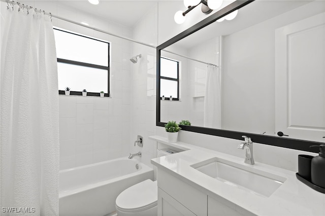 4045 Nova Ln, Naples, FL 34119 - full bathroom with toilet, vanity, and shower / bath combination with curtain