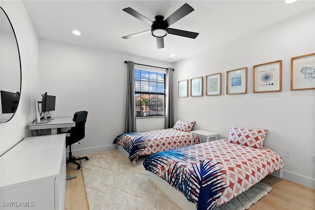 4045 Nova Ln, Naples, FL 34119 - bedroom with light wood-type flooring, baseboards, recessed lighting, and a ceiling fan