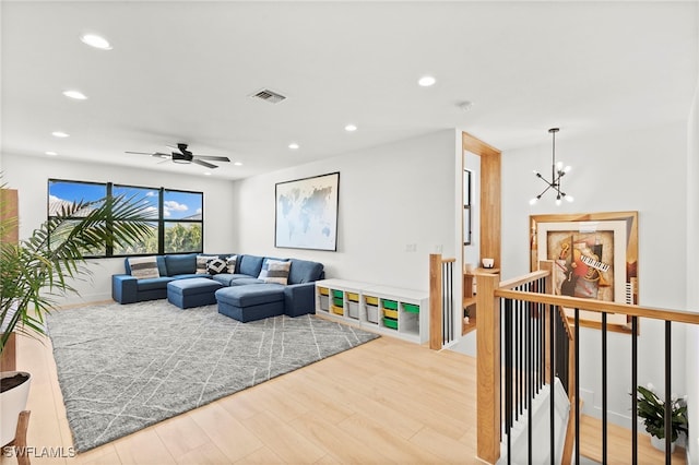 4045 Nova Ln, Naples, FL 34119 - living area with wood finished floors, visible vents, and recessed lighting