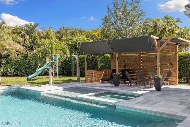 4045 Nova Ln, Naples, FL 34119 - pool featuring a playground, a patio, and an in ground hot tub