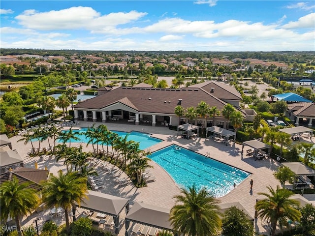 4045 Nova Ln, Naples, FL 34119 - community pool with a residential view and a patio