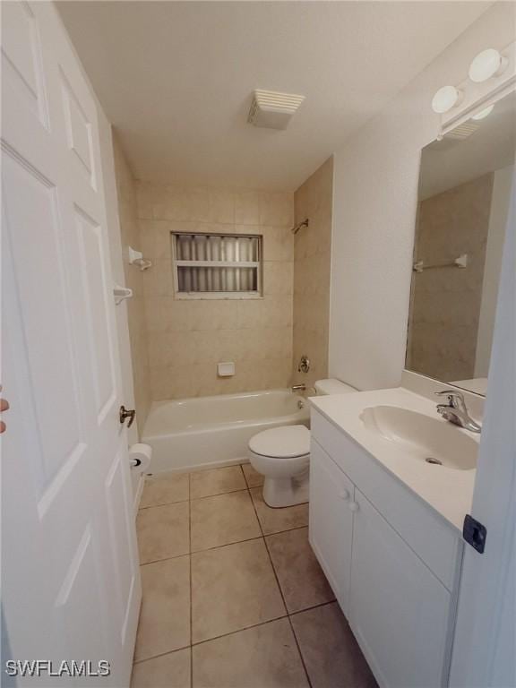bathroom featuring visible vents, toilet, shower / bath combination, vanity, and tile patterned flooring