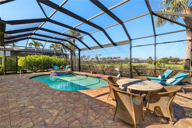 view of swimming pool with a lanai, a patio area, and a pool with connected hot tub