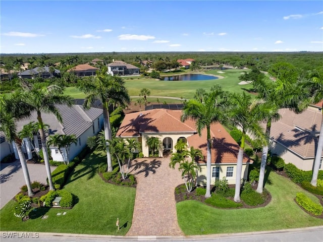 aerial view featuring view of golf course, a water view, and a residential view
