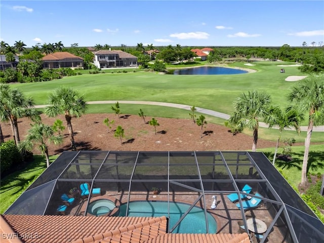 drone / aerial view featuring a water view and golf course view