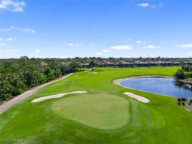 view of property's community with a water view and golf course view