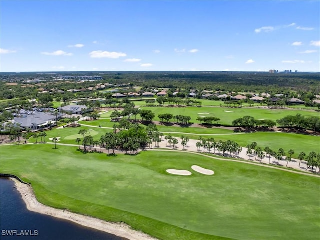 bird's eye view with view of golf course, a residential view, and a water view