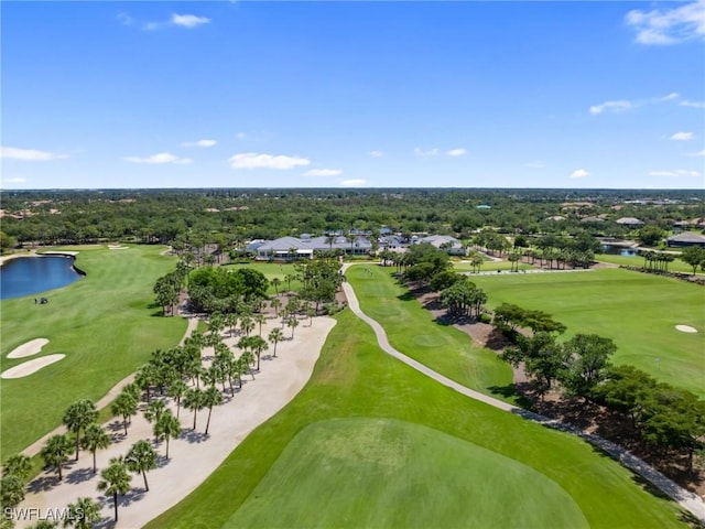 aerial view featuring view of golf course, a water view, and a residential view
