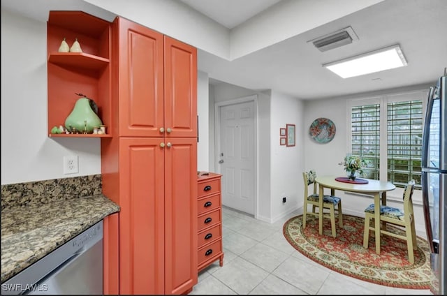 26693 Little John Ct Unit 70, Bonita Springs, FL 34135 - kitchen featuring open shelves, light tile patterned floors, baseboards, appliances with stainless steel finishes, and visible vents