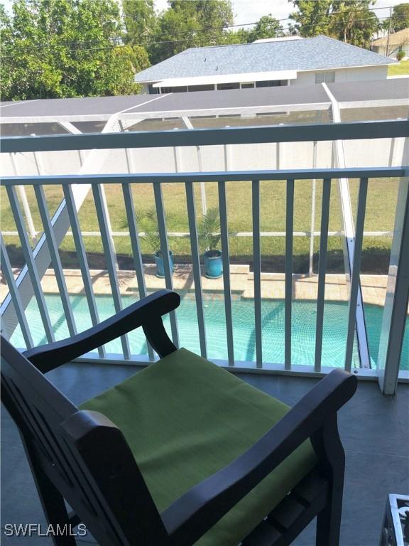 411 SW 34th Ter, Cape Coral, FL 33914 - balcony with view of pool area