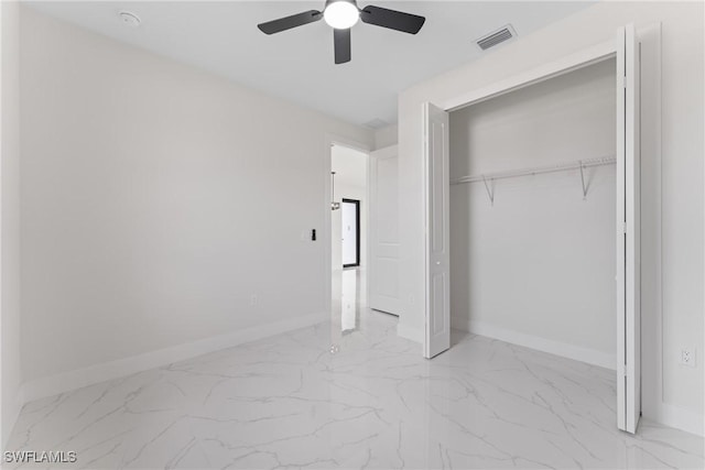 5327 Beauty St, Lehigh Acres, FL 33971 - unfurnished bedroom featuring baseboards, visible vents, marble finish floor, and a closet