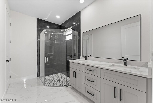 5327 Beauty St, Lehigh Acres, FL 33971 - bathroom with a shower stall, a sink, marble finish floor, double vanity, and baseboards
