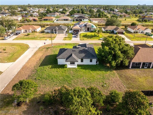 5327 Beauty St, Lehigh Acres, FL 33971 - birds eye view of property featuring a residential view
