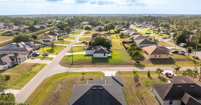 5327 Beauty St, Lehigh Acres, FL 33971 - birds eye view of property with a residential view