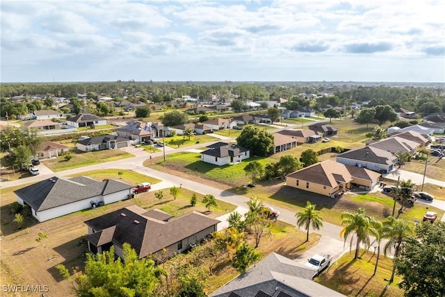 5327 Beauty St, Lehigh Acres, FL 33971 - birds eye view of property with a residential view
