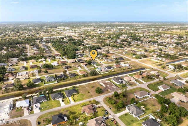 5327 Beauty St, Lehigh Acres, FL 33971 - birds eye view of property with a residential view