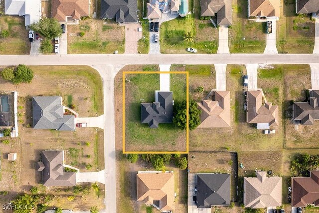 5327 Beauty St, Lehigh Acres, FL 33971 - birds eye view of property with a residential view