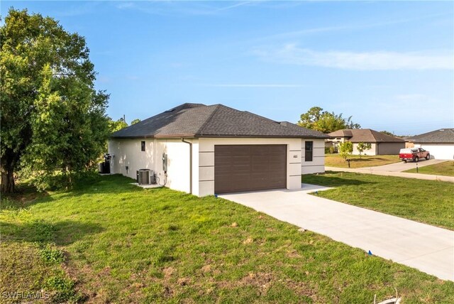 5327 Beauty St, Lehigh Acres, FL 33971 - ranch-style home with stucco siding, a front lawn, concrete driveway, and an attached garage