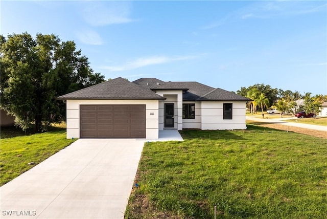 5327 Beauty St, Lehigh Acres, FL 33971 - prairie-style house with a shingled roof, stucco siding, an attached garage, concrete driveway, and a front yard