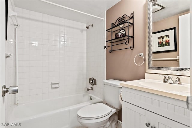 2244 Winkler Ave Unit 110, Fort Myers, FL 33901 - bathroom with washtub / shower combination, vanity, and toilet