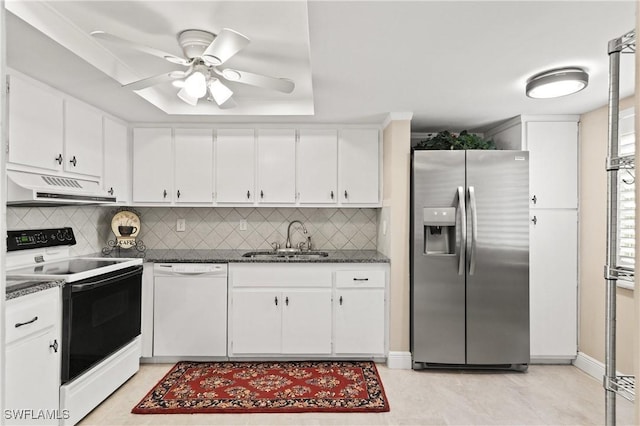 2244 Winkler Ave Unit 110, Fort Myers, FL 33901 - kitchen featuring under cabinet range hood, white appliances, a sink, and decorative backsplash