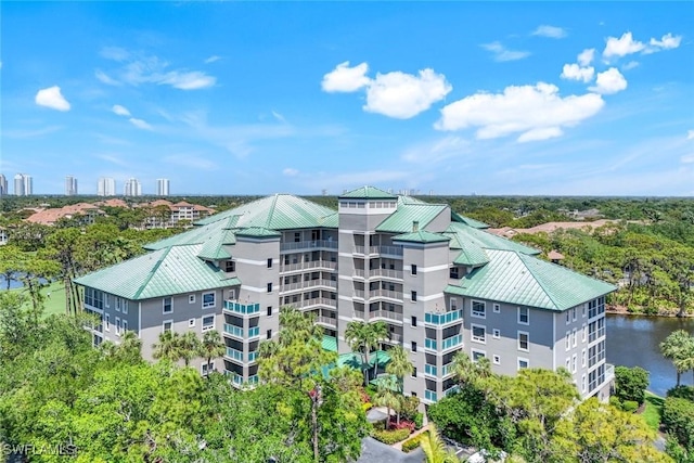 birds eye view of property featuring a water view