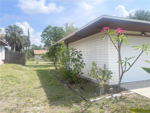 21070 Delake Ave, Port Charlotte, FL 33954 - view of property exterior with a garage