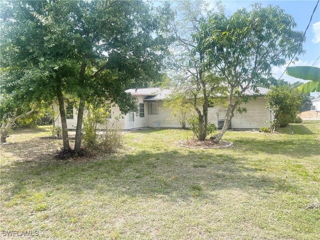 21070 Delake Ave, Port Charlotte, FL 33954 - view of grassy yard