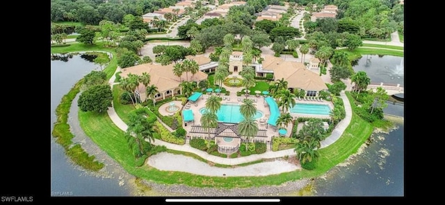 drone / aerial view with a water view