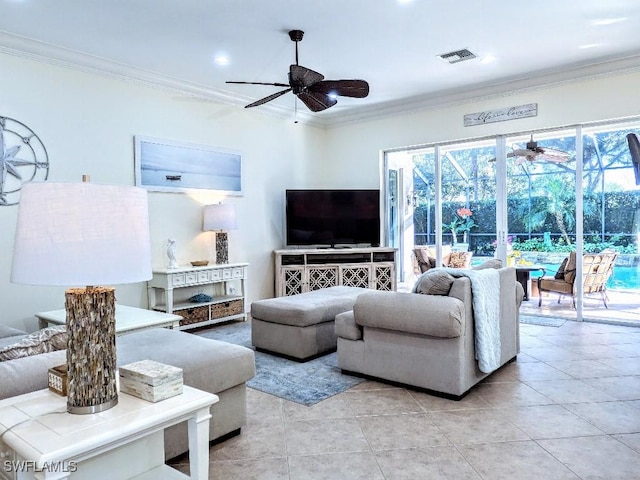 living room featuring ornamental molding, a ceiling fan, and visible vents
