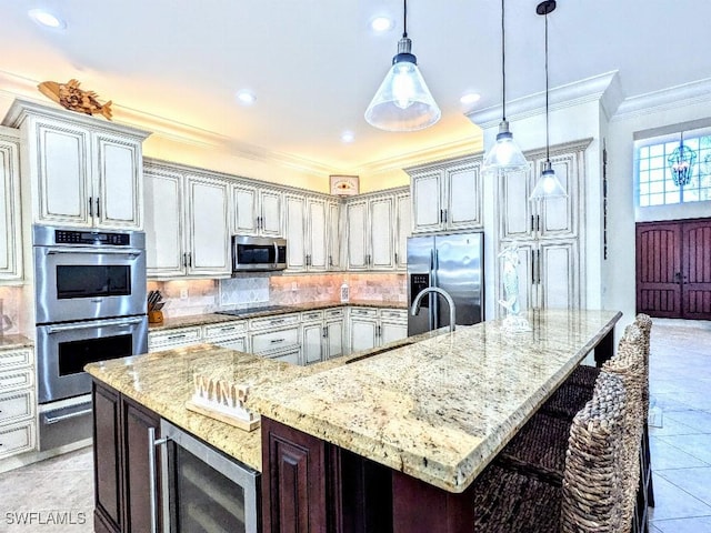 kitchen featuring a sink, appliances with stainless steel finishes, crown molding, a warming drawer, and decorative backsplash