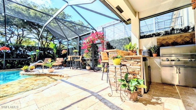 view of patio / terrace featuring an outdoor pool, a lanai, and area for grilling