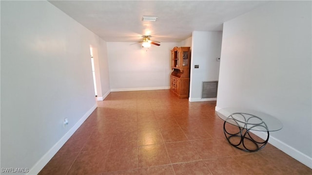 509 W Obispo Ave, Clewiston, FL 33440 - hall with tile patterned floors, visible vents, and baseboards