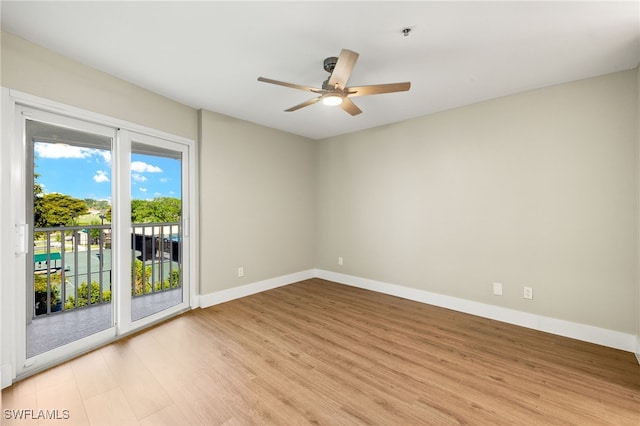 9200 Highland Woods Blvd Unit 1309, Bonita Springs, FL 34135 - unfurnished room featuring ceiling fan, light wood finished floors, and baseboards