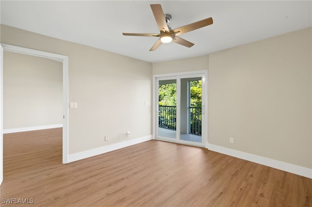 9200 Highland Woods Blvd Unit 1309, Bonita Springs, FL 34135 - empty room featuring baseboards, light wood finished floors, and a ceiling fan